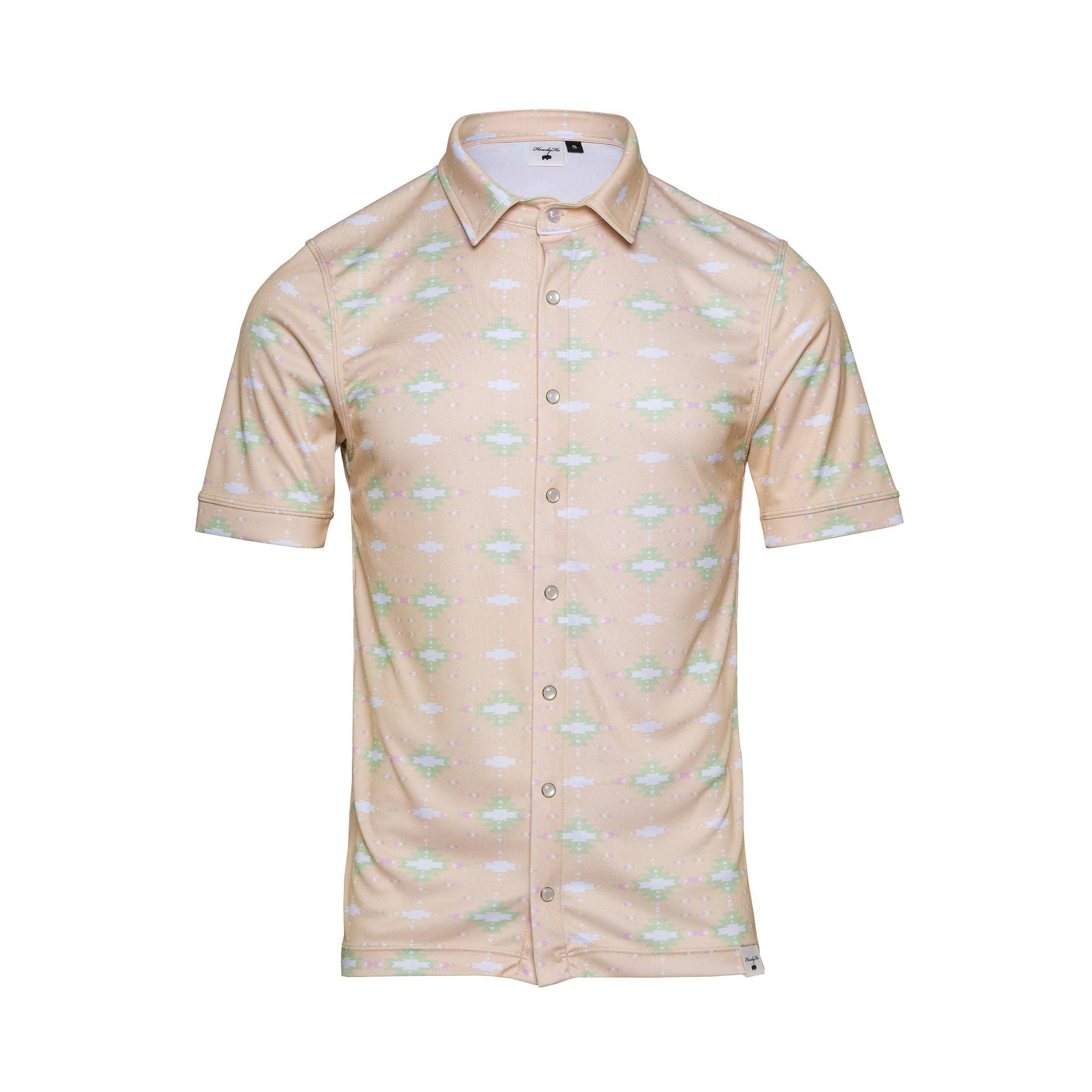 The Sunrise Serenity shirt displayed against a white background, showcasing a tan color with a soft pattern of green and white floral motifs. The shirt features a classic collar, short sleeves, and a row of neat, visible button closures, giving it a crisp, summer-ready look.
